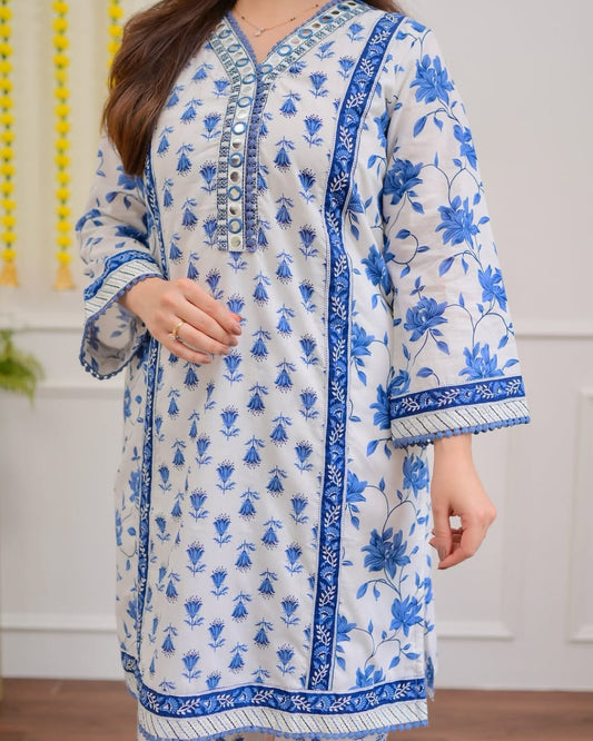 This season, let your wardrobe bloom with sophistication.our finely tailored cotton shuts features an *embroidery work and lacework on nack .* artistically crafted short kurta with intricate floral moti
